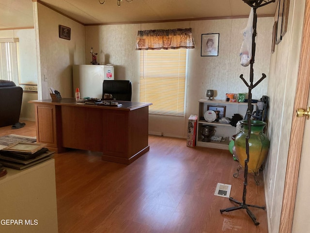770 Eagles Den Ln, El Paso, TX 79927 - home office featuring dark wood-style flooring, visible vents, and crown molding