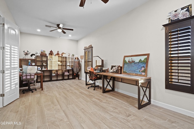 office space featuring a ceiling fan, recessed lighting, baseboards, and wood finished floors