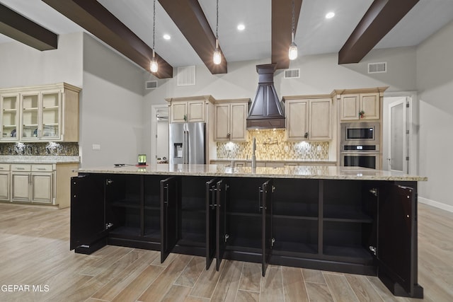 kitchen with visible vents, stainless steel appliances, and beam ceiling