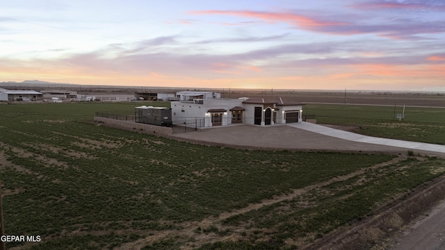 exterior space with a rural view