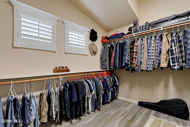 3537 Tierra Bahia Dr, El Paso, TX 79938 - walk in closet featuring vaulted ceiling and wood finished floors