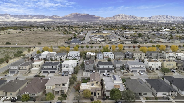 bird's eye view featuring a residential view and a mountain view