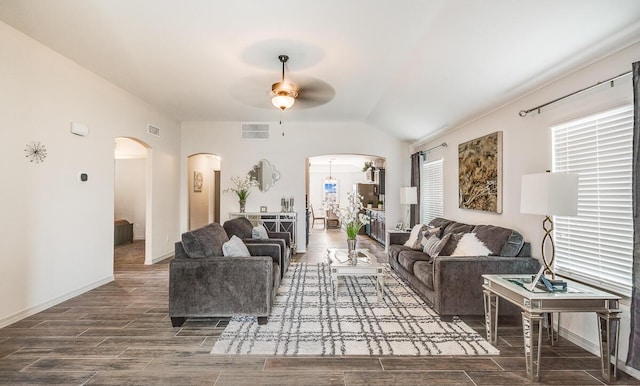 14291 Armando Silva Dr, El Paso, TX 79938 - living area featuring arched walkways, visible vents, ceiling fan, and wood tiled floor