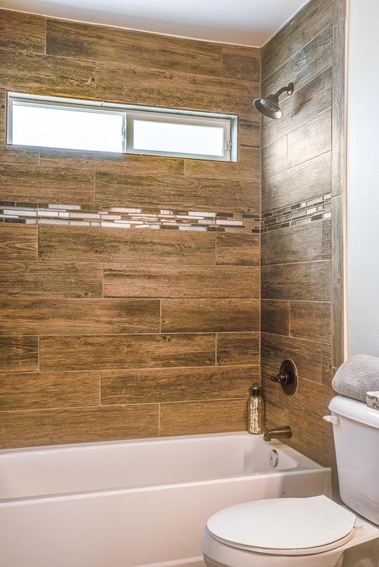 14291 Armando Silva Dr, El Paso, TX 79938 - full bath featuring plenty of natural light, tub / shower combination, and toilet