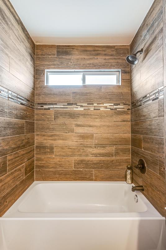 14291 Armando Silva Dr, El Paso, TX 79938 - bathroom featuring shower / washtub combination