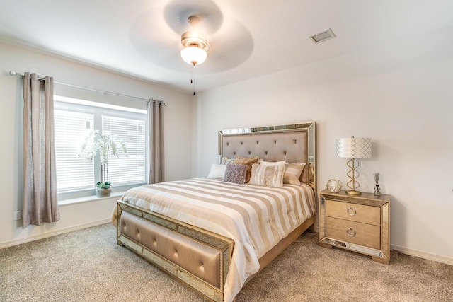 14291 Armando Silva Dr, El Paso, TX 79938 - bedroom with a ceiling fan, light carpet, visible vents, and baseboards