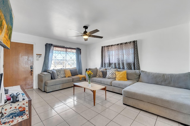 living room featuring a ceiling fan and light tile patterned flooring