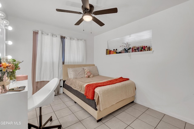 bedroom featuring ceiling fan and light tile patterned flooring