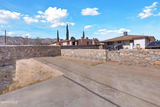 view of yard featuring a gate and fence