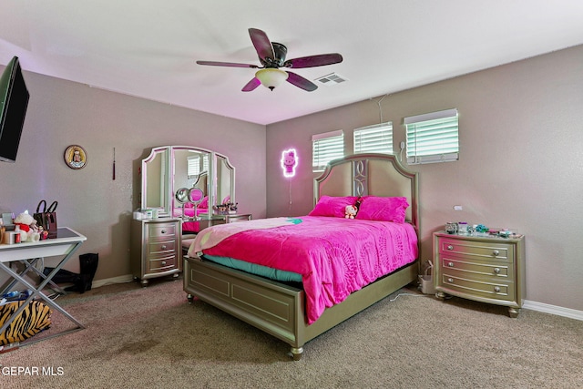 bedroom featuring carpet flooring, visible vents, and baseboards