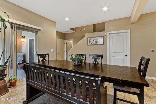 dining area with baseboards, visible vents, and recessed lighting