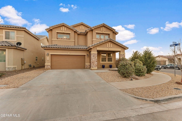 view of front facade featuring a garage, a tile roof, driveway, stone siding, and stucco siding