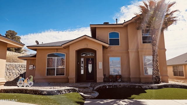 view of front of property featuring stucco siding