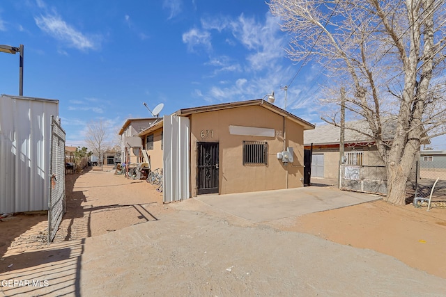 view of outdoor structure with fence