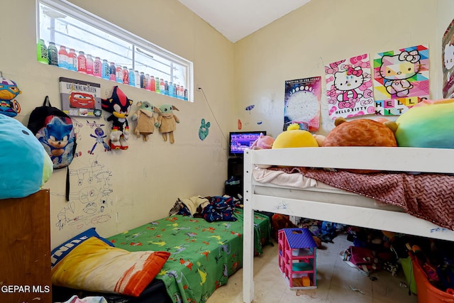 bedroom featuring lofted ceiling