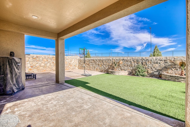 view of patio with a fenced backyard