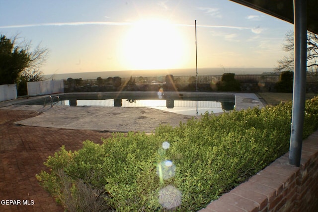 view of swimming pool with a fenced in pool, a patio area, and fence