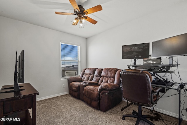 home office featuring baseboards, a ceiling fan, and carpet flooring