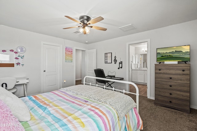 bedroom with carpet, visible vents, ceiling fan, and connected bathroom