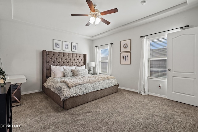 bedroom with carpet, a ceiling fan, and baseboards