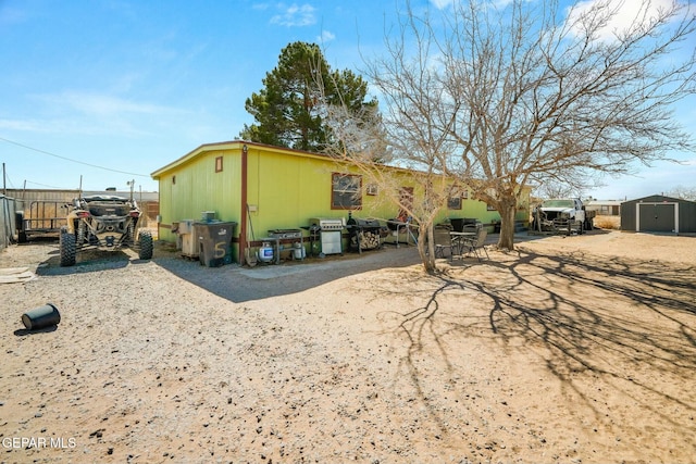 160 Indian Head Rd, Tornillo, TX 79853 - exterior space with a storage shed, fence, and an outdoor structure