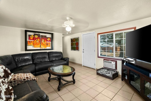 160 Indian Head Rd, Tornillo, TX 79853 - living area featuring light tile patterned floors, ceiling fan, a textured ceiling, baseboards, and a wall mounted AC