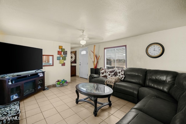 160 Indian Head Rd, Tornillo, TX 79853 - living room with light tile patterned floors and a textured ceiling