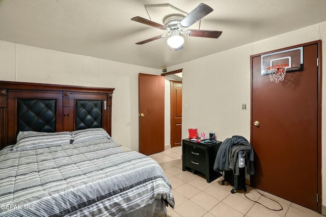 160 Indian Head Rd, Tornillo, TX 79853 - bedroom featuring light tile patterned floors, ceiling fan, and a textured ceiling