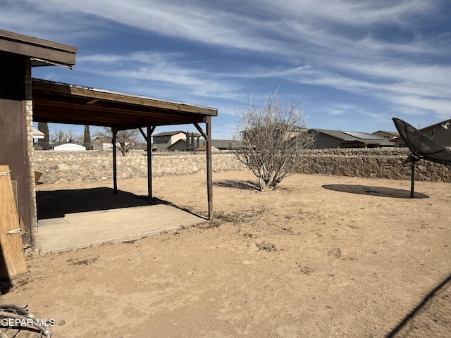 view of yard featuring a patio area and fence