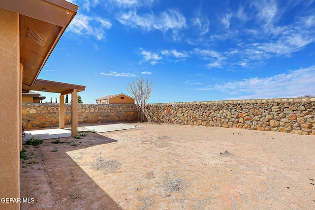 view of yard featuring a fenced backyard and a patio