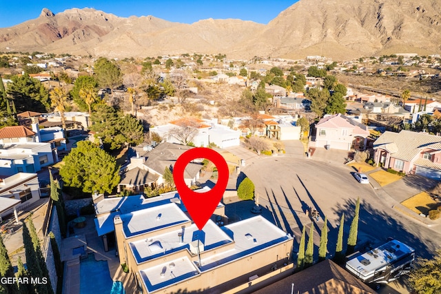 bird's eye view featuring a residential view and a mountain view