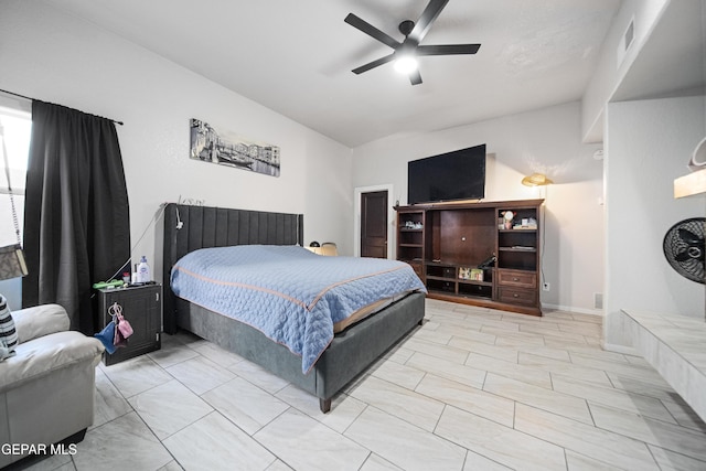 bedroom featuring lofted ceiling, ceiling fan, and visible vents