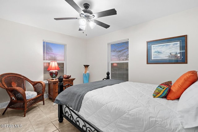 bedroom with light tile patterned flooring and a ceiling fan