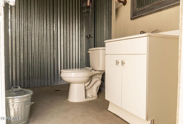 full bath featuring vanity and toilet