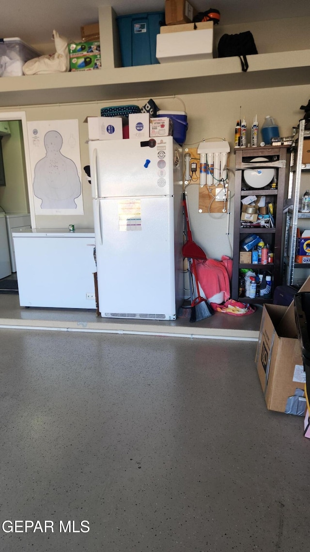 garage featuring freestanding refrigerator