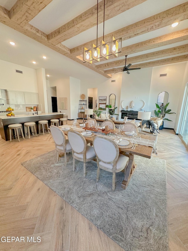 dining area featuring beamed ceiling, recessed lighting, visible vents, and a ceiling fan