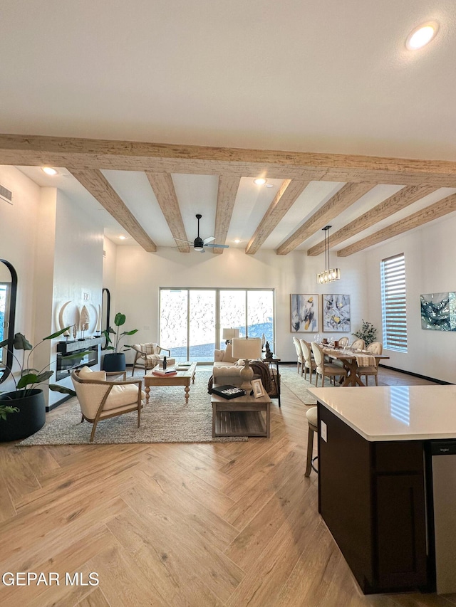 living area with visible vents, a ceiling fan, beam ceiling, and recessed lighting