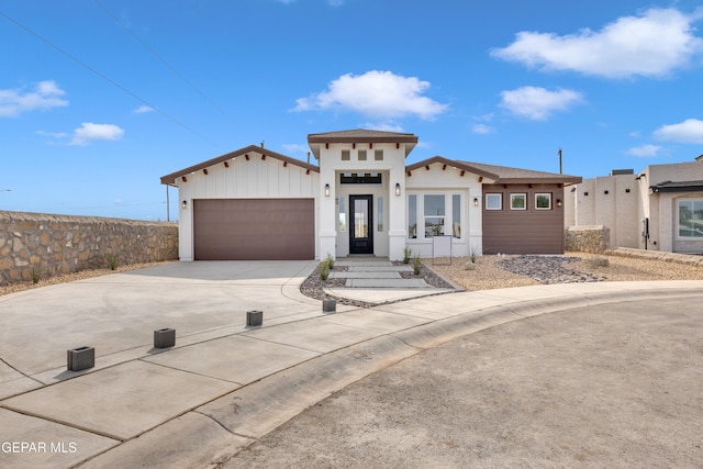 view of front of property with an attached garage and driveway