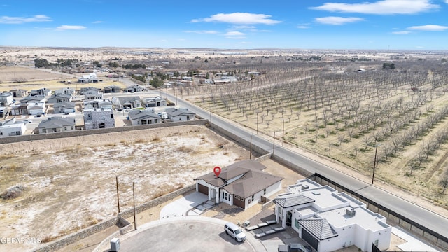 birds eye view of property with a residential view