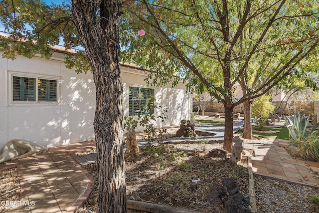 exterior space with stucco siding