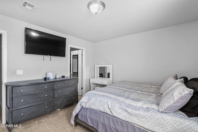 bedroom featuring carpet flooring and visible vents