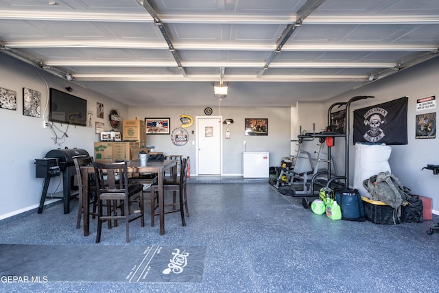 garage featuring baseboards