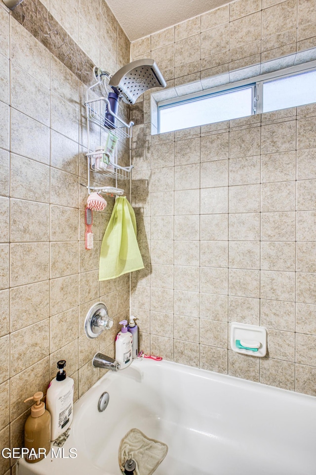 bathroom with shower / bathtub combination