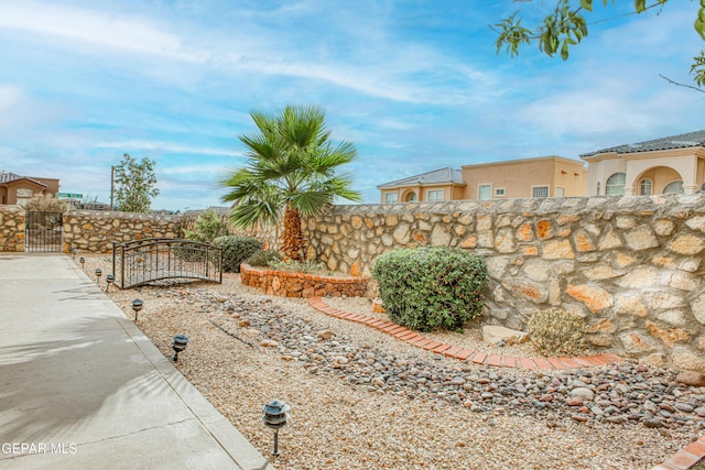 view of yard with a gate and fence