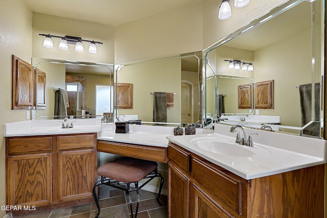 bathroom featuring tile patterned floors and vanity