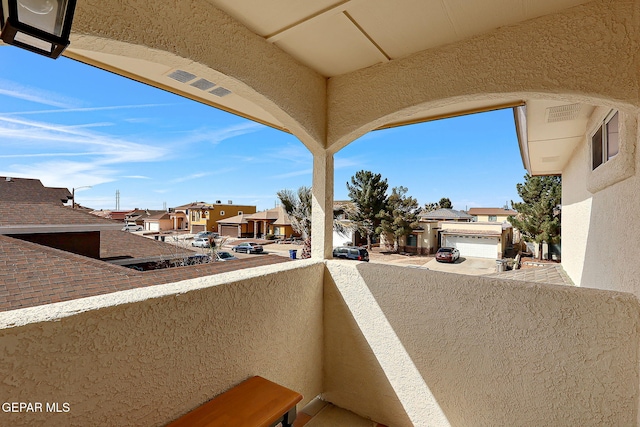 balcony featuring a residential view