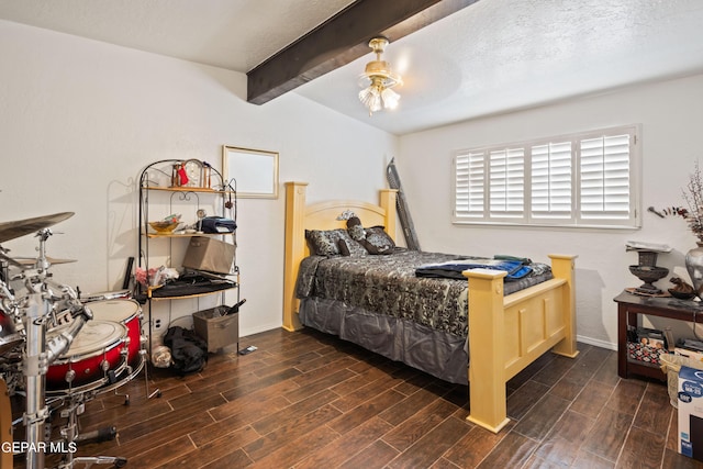 bedroom featuring lofted ceiling with beams, a textured ceiling, a ceiling fan, and wood tiled floor