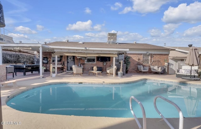 pool featuring a patio