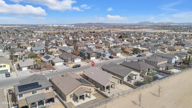 bird's eye view featuring a mountain view and a residential view