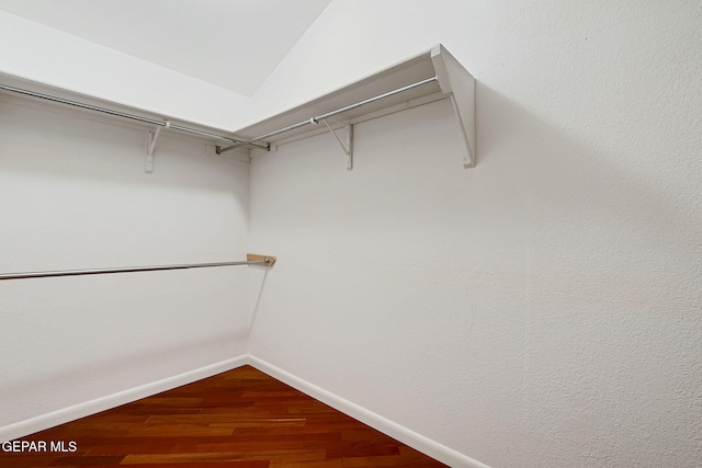 spacious closet with wood finished floors